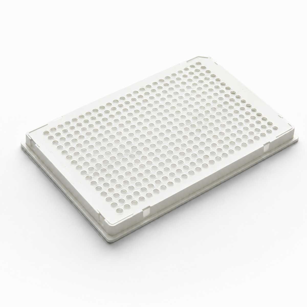White 384-well, 40 µL full-skirted PCR plate with white frame and single-notch configuration, designed for high-throughput PCR and qPCR workflows.
