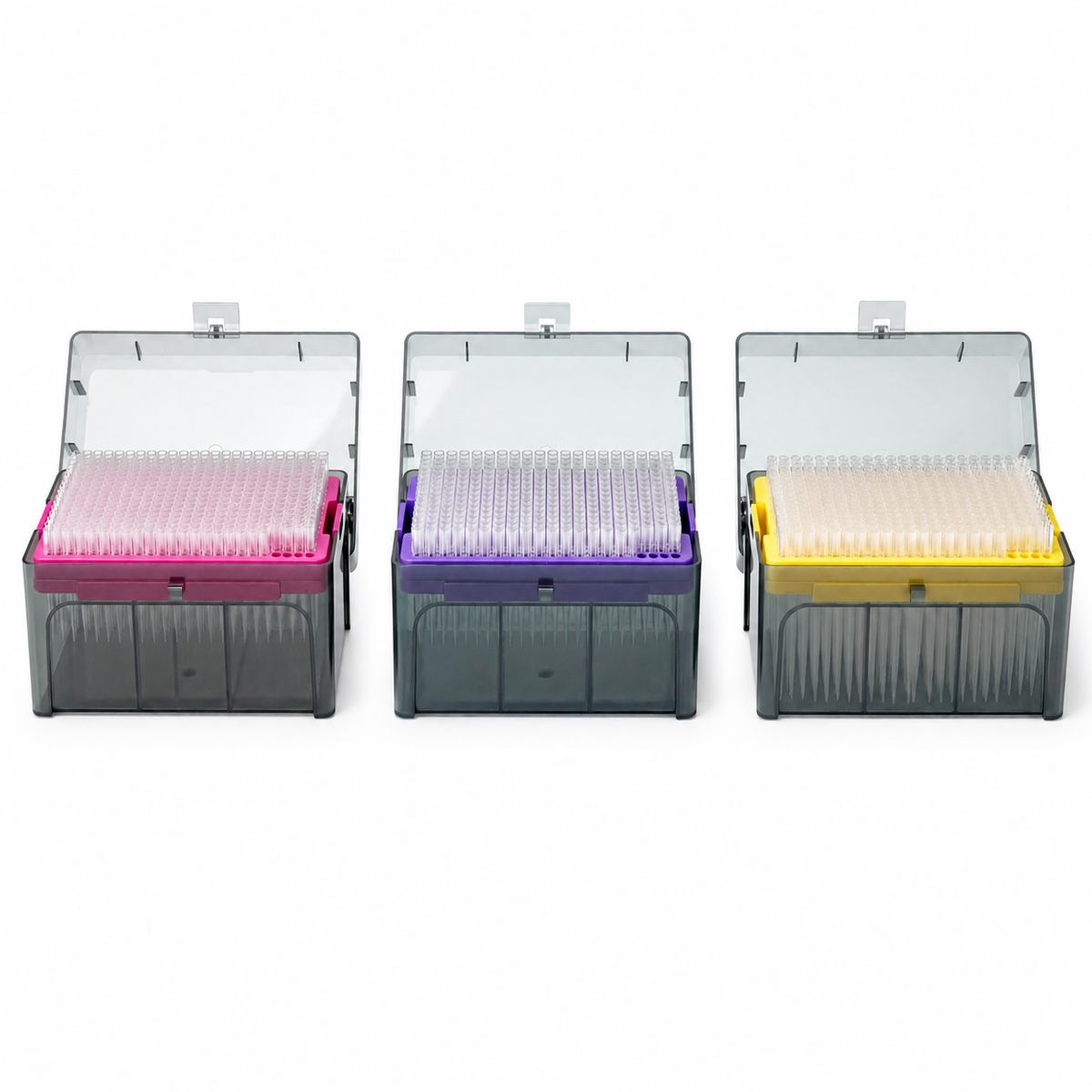 Three BasePrime Thermo ClipTip-compatible 384-format pipette tip racks shown side by side on a clean white background, featuring pink, purple, and yellow rack inserts to represent the available volume formats.
